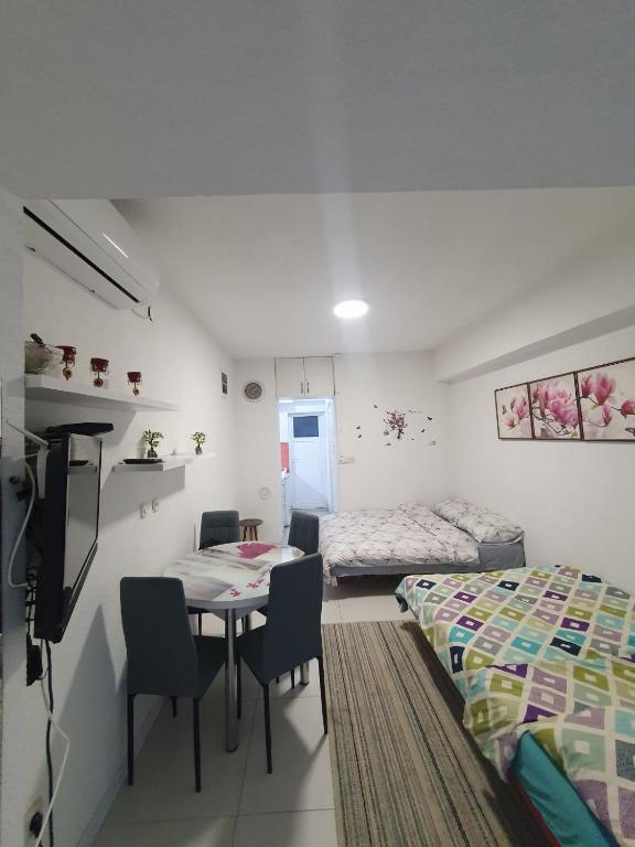 Katil atau katil-katil dalam bilik di Apartman Lili