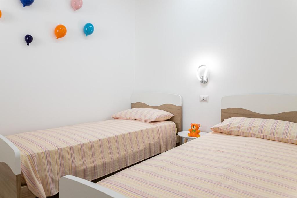 Łóżko lub łóżka w pokoju w obiekcie Villa Marisa Holiday Home