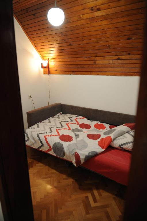 Postel nebo postele na pokoji v ubytování Vikend-kuca Vevericji Kraj