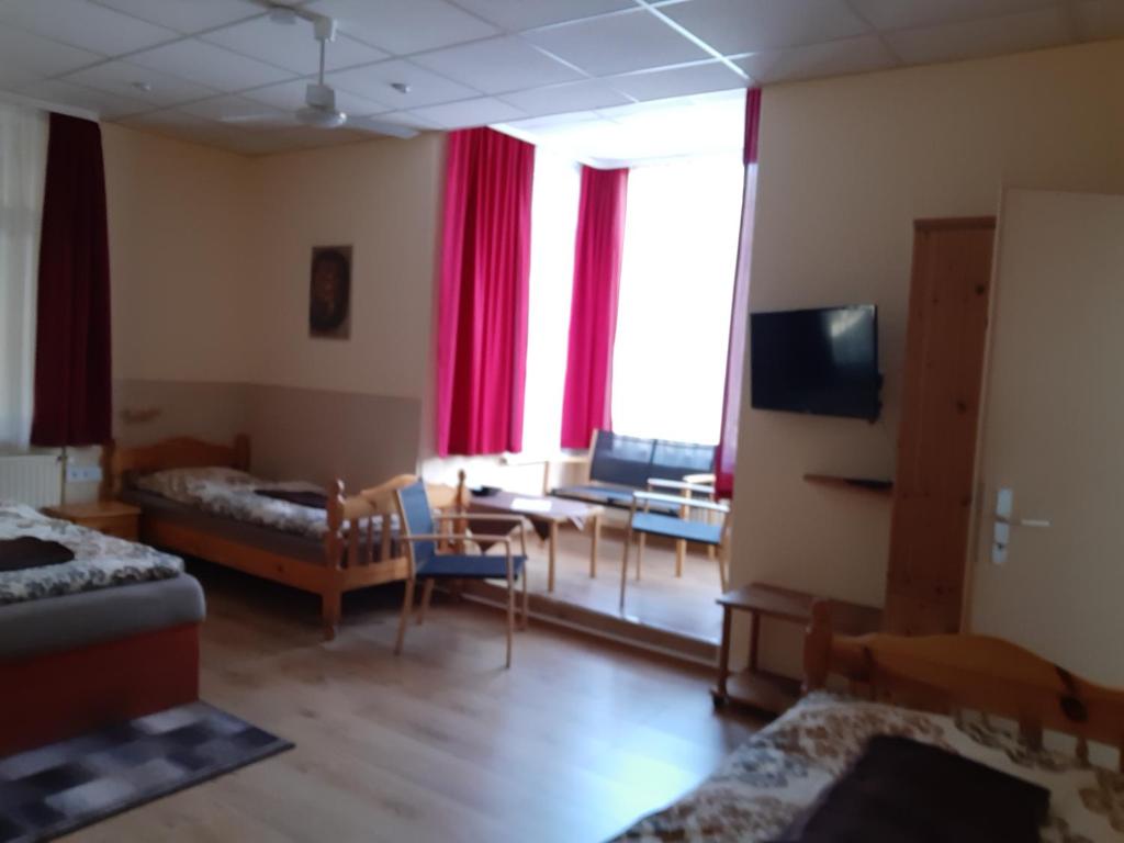 Postel nebo postele na pokoji v ubytování Pension Lehmann
