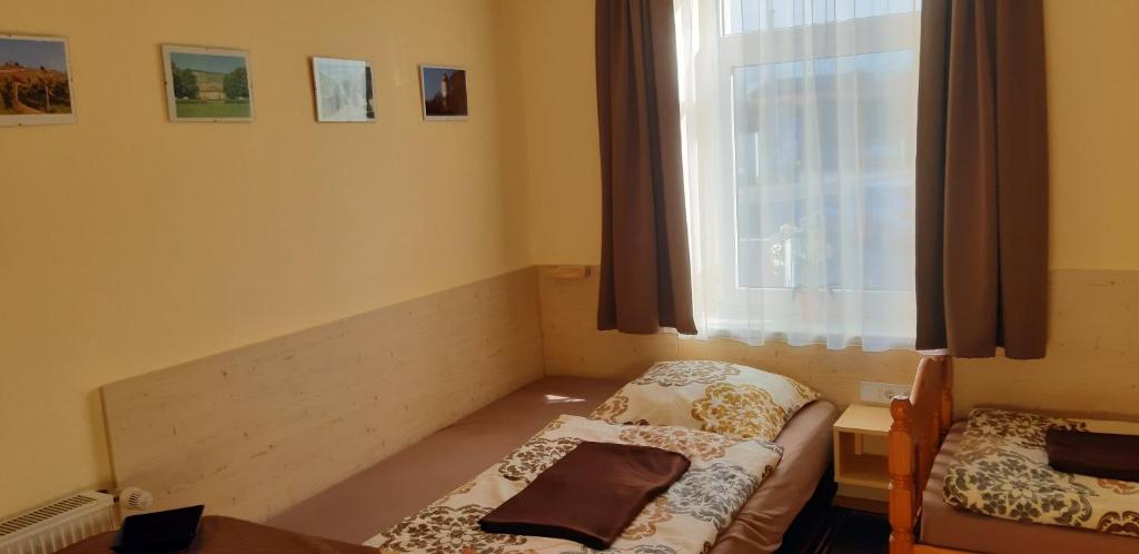 Postel nebo postele na pokoji v ubytování Pension Lehmann