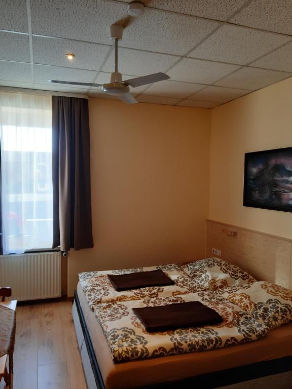 Postel nebo postele na pokoji v ubytování Pension Lehmann