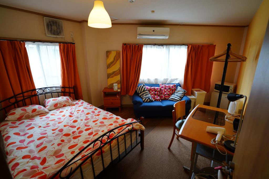 Postel nebo postele na pokoji v ubytování DEER Hostel OSAKA NAMBA