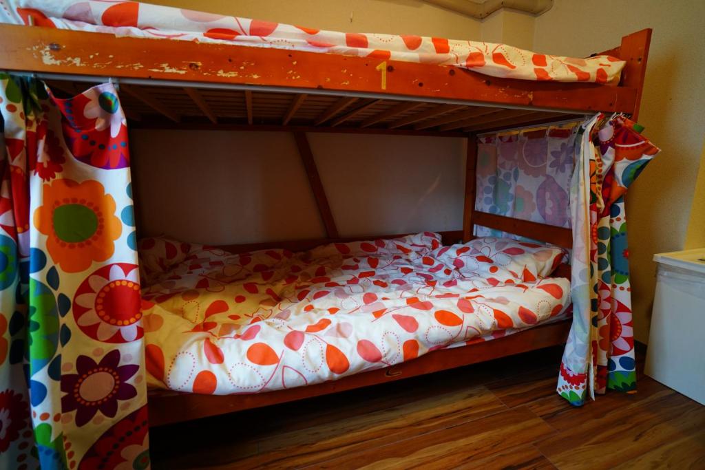 Postel nebo postele na pokoji v ubytování DEER Hostel OSAKA NAMBA