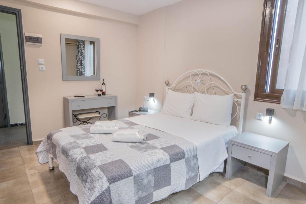 Postel nebo postele na pokoji v ubytování Anita Hotel