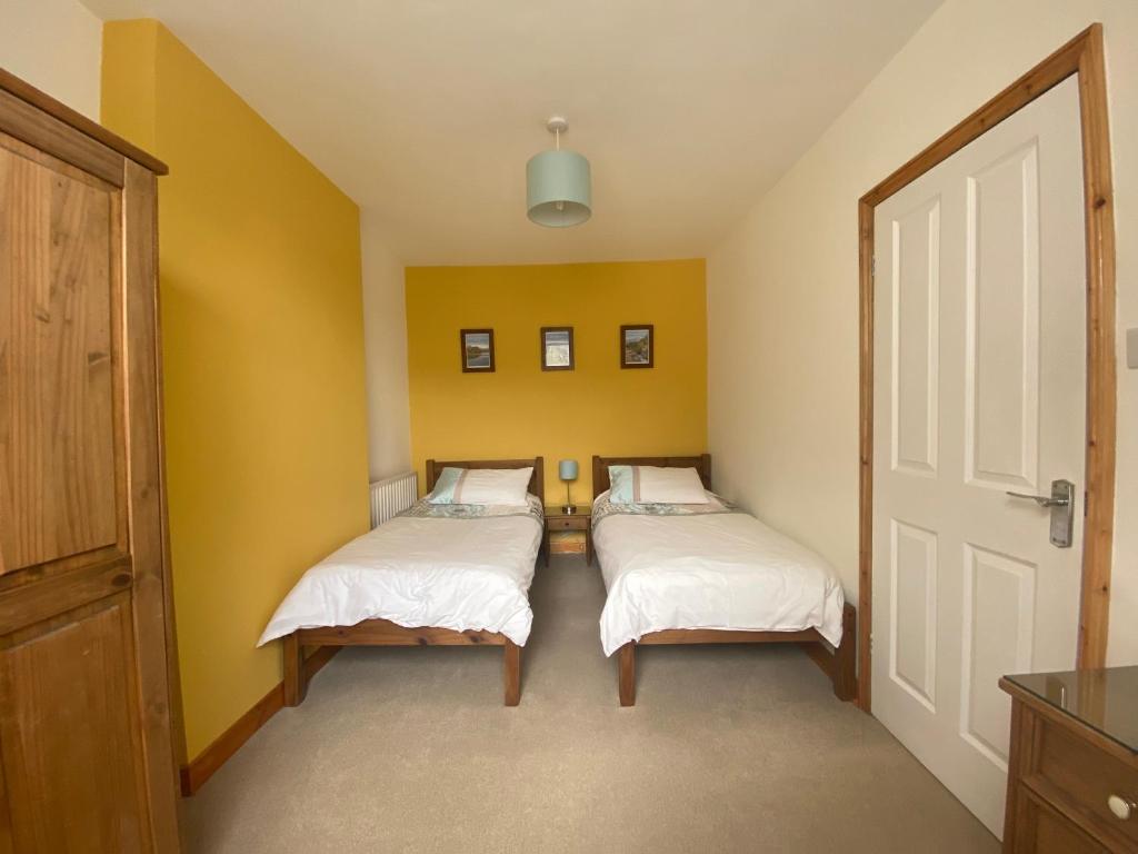 Postel nebo postele na pokoji v ubytování Felltop Cottage