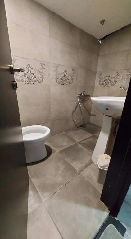 Koupelna v ubytování SunnyAvlabari Homestay