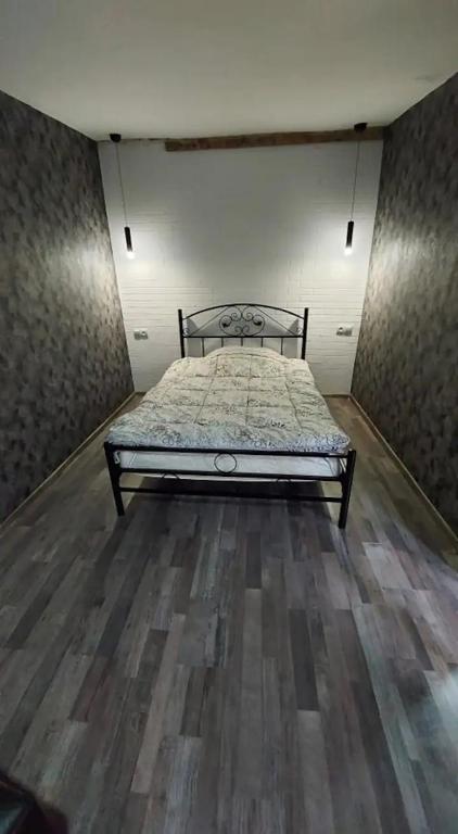 Postel nebo postele na pokoji v ubytování SunnyAvlabari Homestay