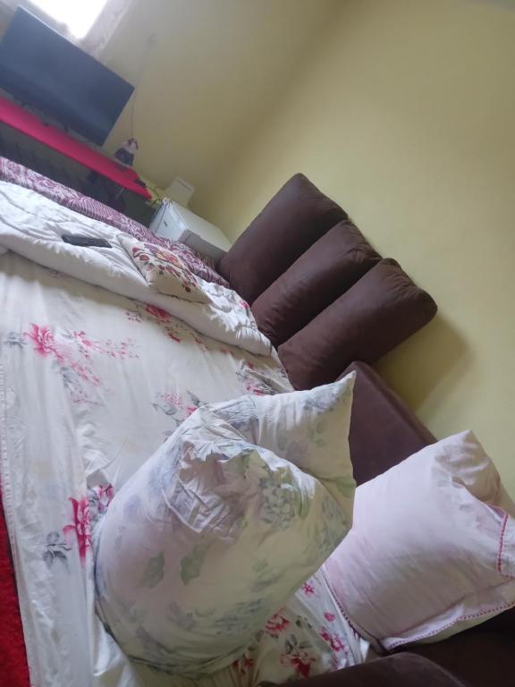 Postel nebo postele na pokoji v ubytování RUSTIC SEJOUR,Roşia Montana