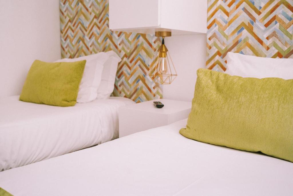 Postel nebo postele na pokoji v ubytování Top'Otel