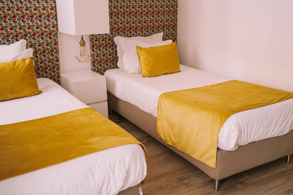 Postel nebo postele na pokoji v ubytování Top'Otel
