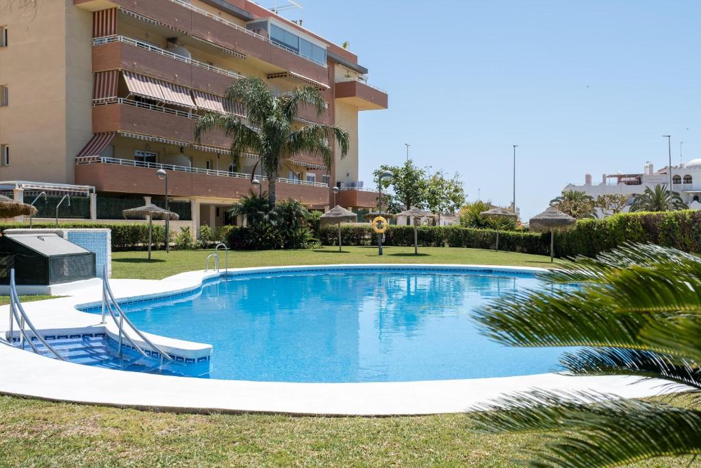 Poolen vid eller i närheten av Apartamento Vistas al Mar