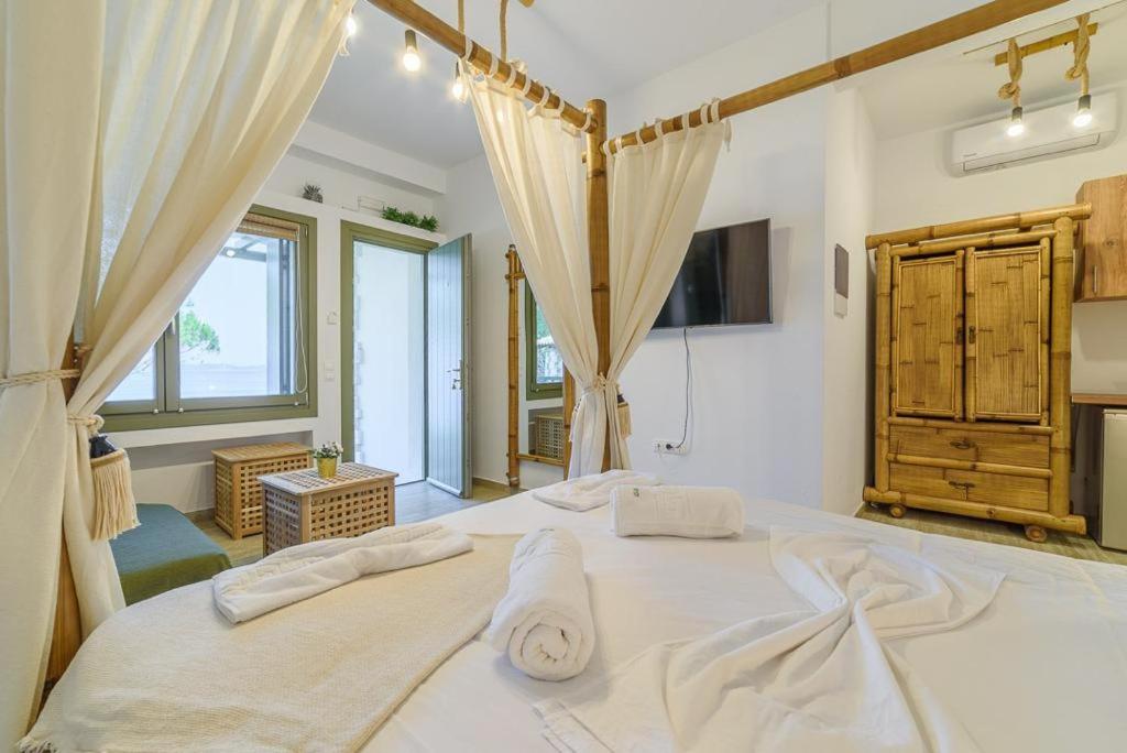 Postel nebo postele na pokoji v ubytování CASA DOBRESCU KATIGIORGIS PELION