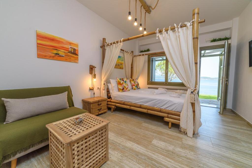 Postel nebo postele na pokoji v ubytování CASA DOBRESCU KATIGIORGIS PELION