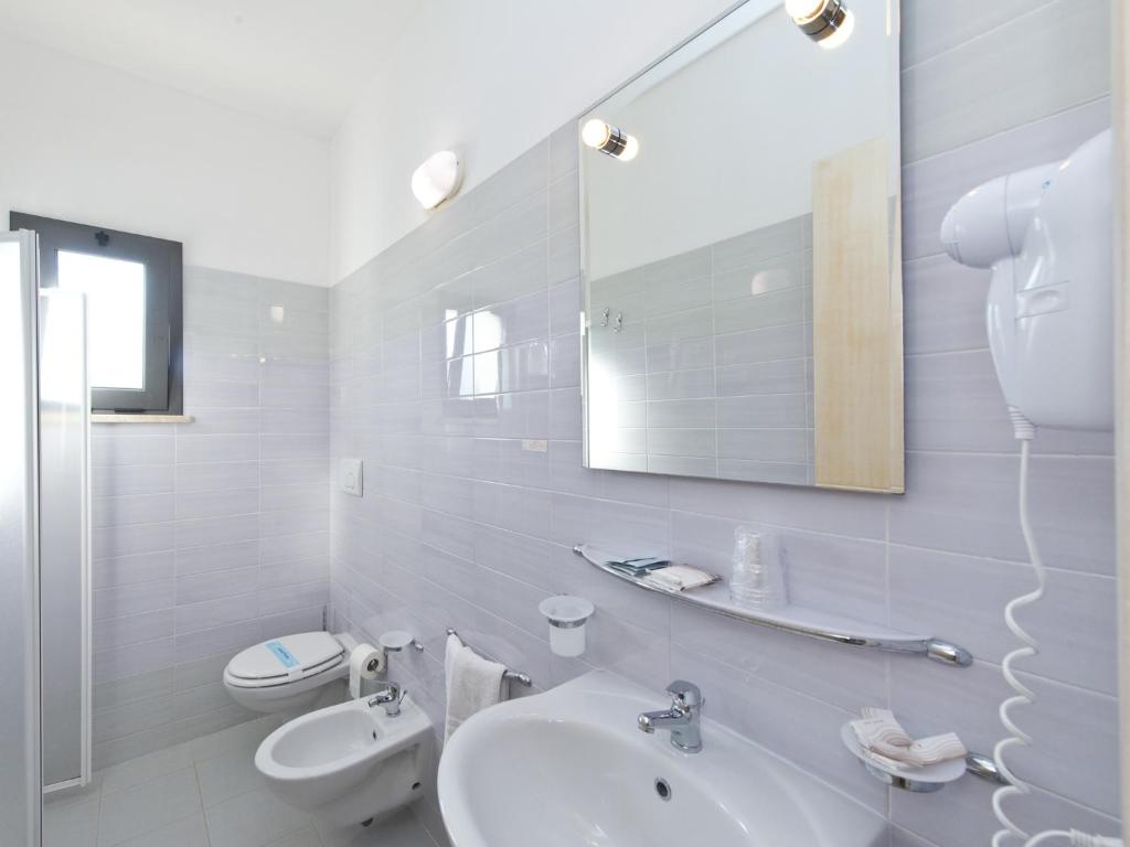 Koupelna v ubytování Hotel Club Koiné