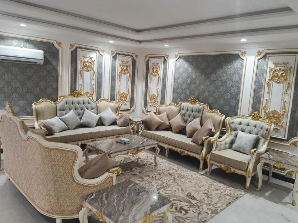 Posezení v ubytování رمادا نيت للشقق المخدومة