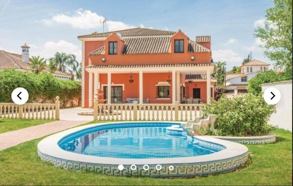 a house with a swimming pool in front of a house at HIDALMAR in Arcos de la Frontera