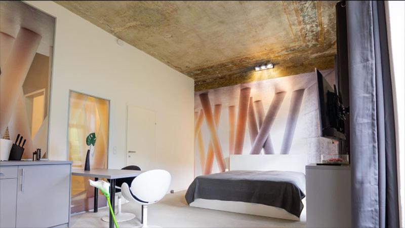 A bed or beds in a room at LK43-lodging city-apartments, kontaktlos mit Self Check-In