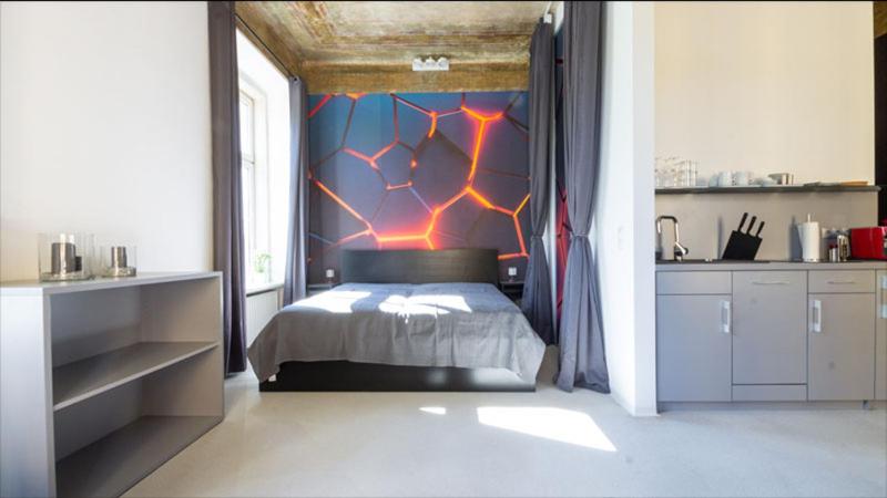 A bed or beds in a room at LK43-lodging city-apartments, kontaktlos mit Self Check-In