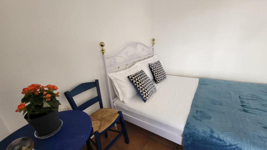 Postel nebo postele na pokoji v ubytování Mina House Siviri
