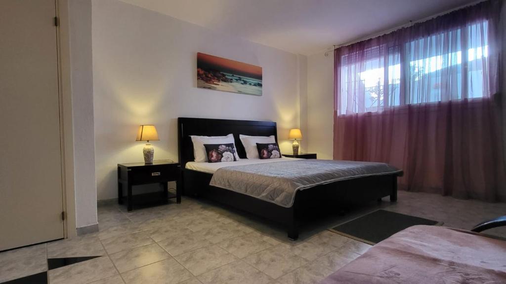 Postel nebo postele na pokoji v ubytování Mina House Siviri
