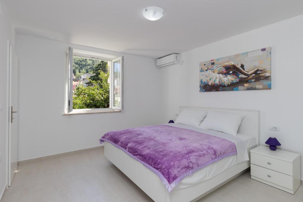 Katil atau katil-katil dalam bilik di Apartments Fortinia Dubrovnik- FREE PARKING