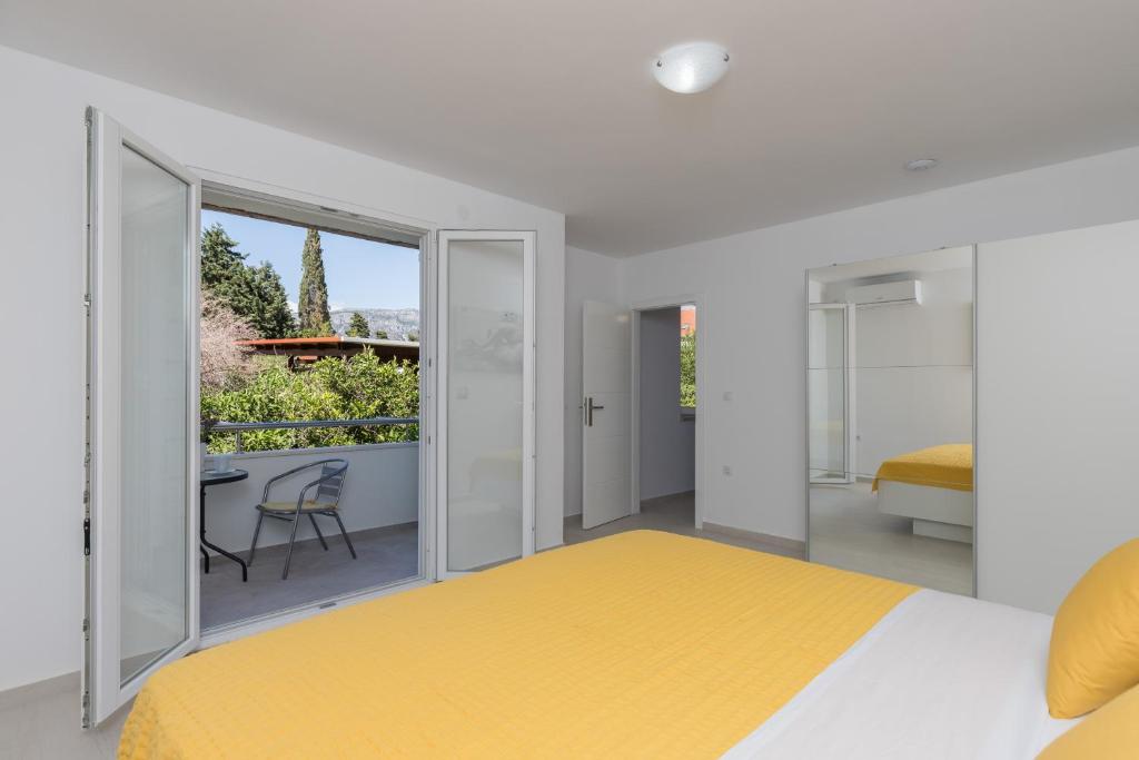 Posteľ alebo postele v izbe v ubytovaní Apartments Fortinia Dubrovnik- FREE PARKING