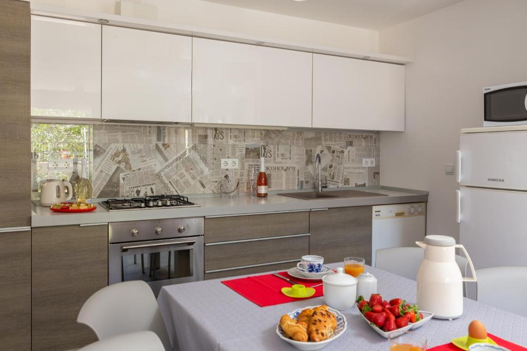 Kuchyň nebo kuchyňský kout v ubytování Seaside Apartment Kamelia