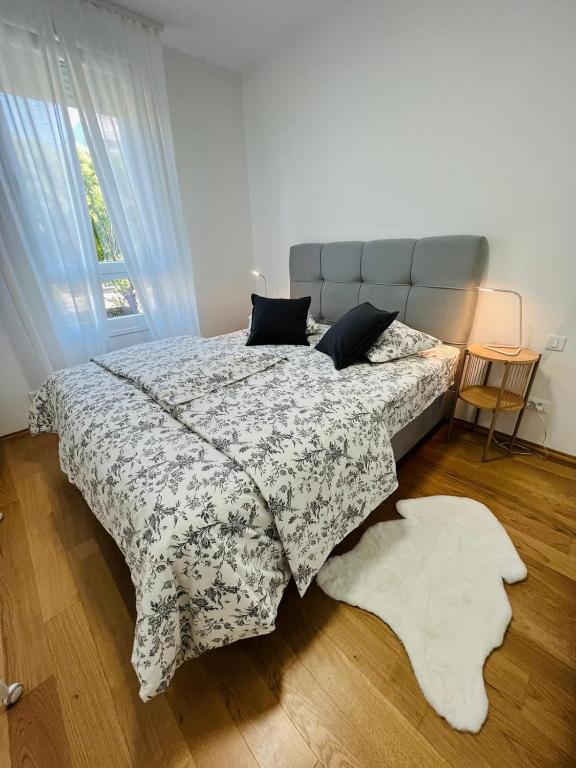 Posteľ alebo postele v izbe v ubytovaní Apartment Allora