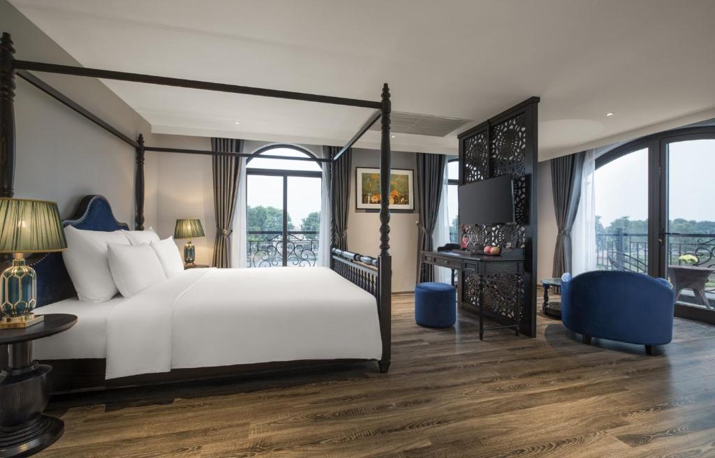Кровать или кровати в номере Lalita Boutique Hotel & Spa Ninh Binh