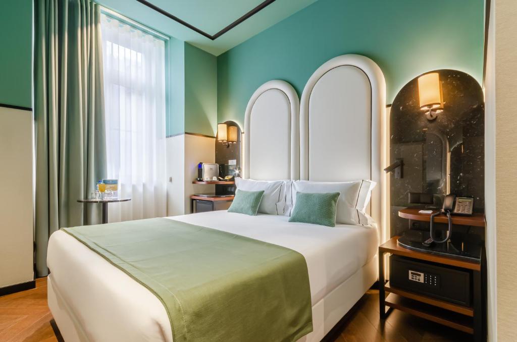 Nicola Rossio Hotelにあるベッド