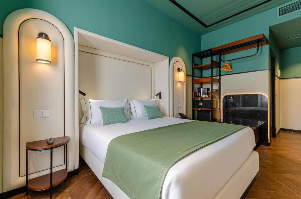 Nicola Rossio Hotelにあるベッド