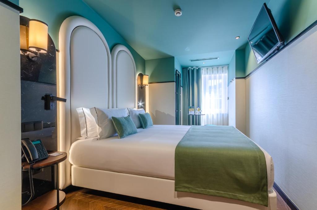 Nicola Rossio Hotelにあるベッド