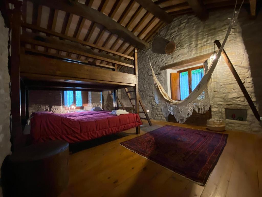 Postel nebo postele na pokoji v ubytování Borgo Corniola B&B Naturista