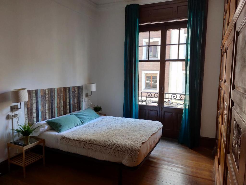 Postel nebo postele na pokoji v ubytování Zentric Hostel
