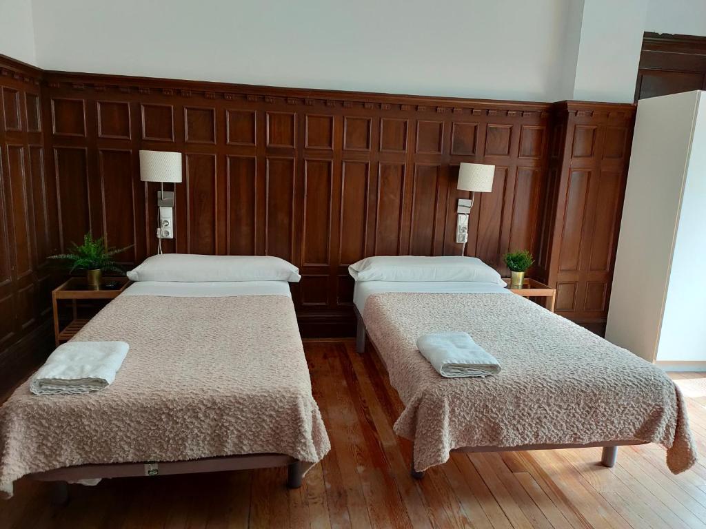 Postel nebo postele na pokoji v ubytování Zentric Hostel