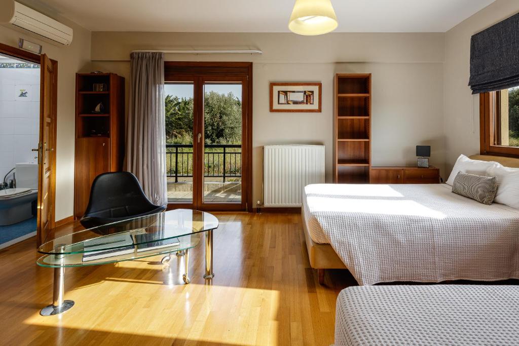 Postel nebo postele na pokoji v ubytování Palm Hill Villa