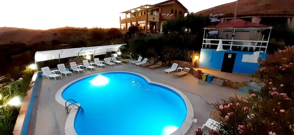 an overhead view of a swimming pool at a resort at Terra Nostra in Cattolica Eraclea