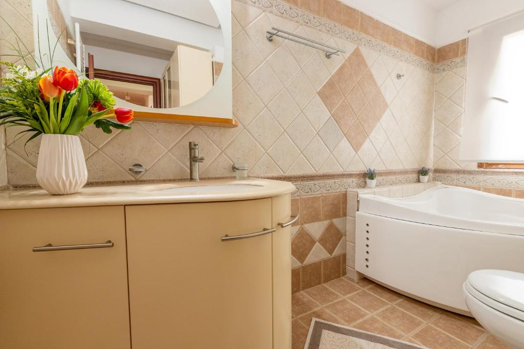 Kúpeľňa v ubytovaní Selia Villa Pefkochori
