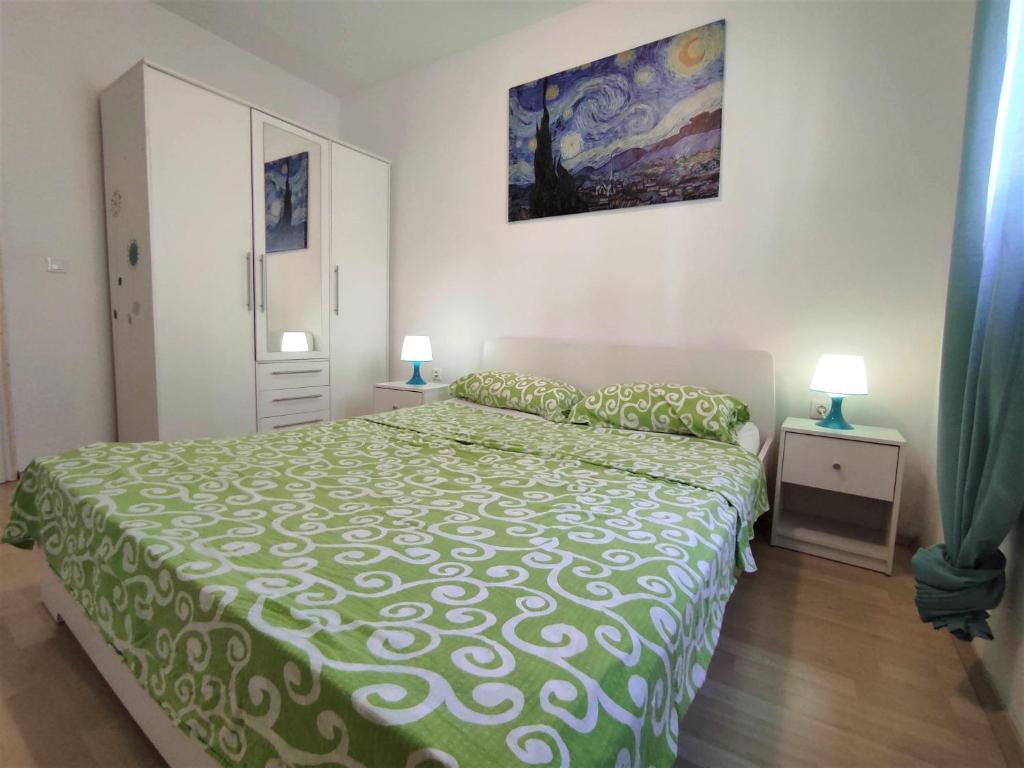 Posteľ alebo postele v izbe v ubytovaní Apartman Kamenjak