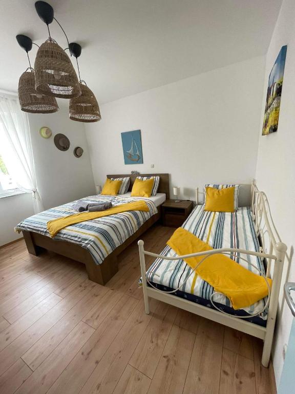 Postel nebo postele na pokoji v ubytování Kuća za odmor Pobor JADRANOVO