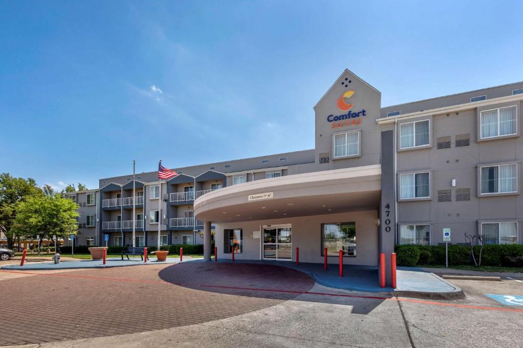 a rendering of a hotel in front of a building at Comfort Suites DFW Airport in Irving