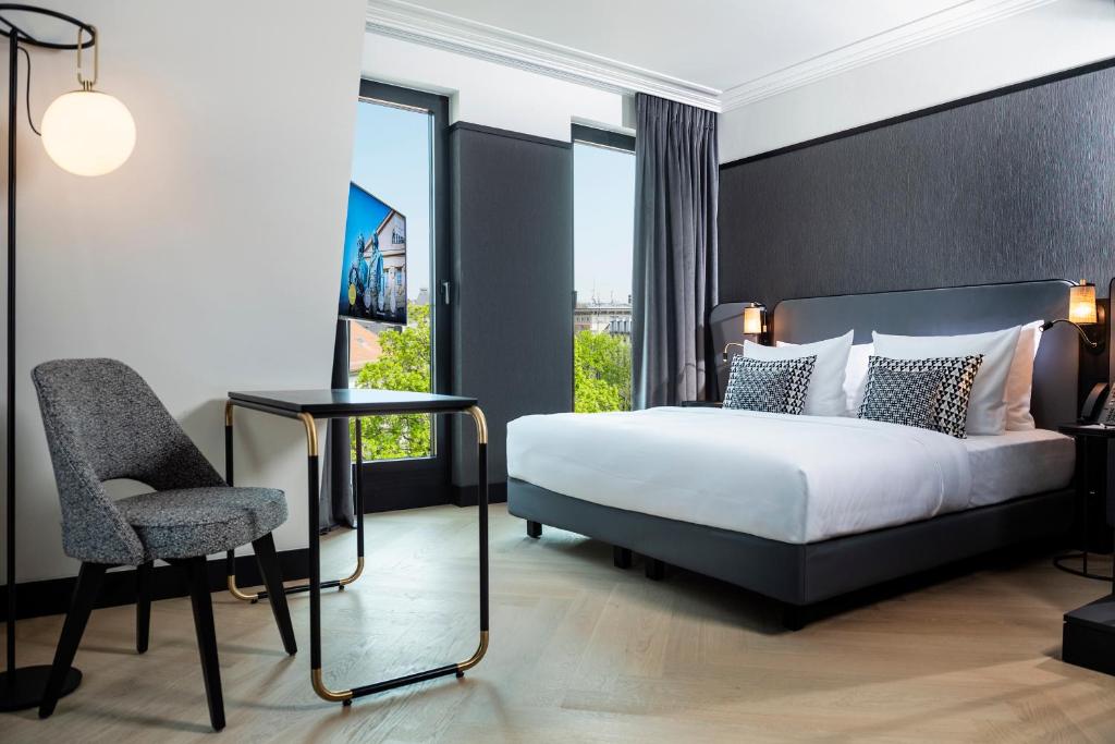 Ένα ή περισσότερα κρεβάτια σε δωμάτιο στο Hotel Schillerhof, Weimar
