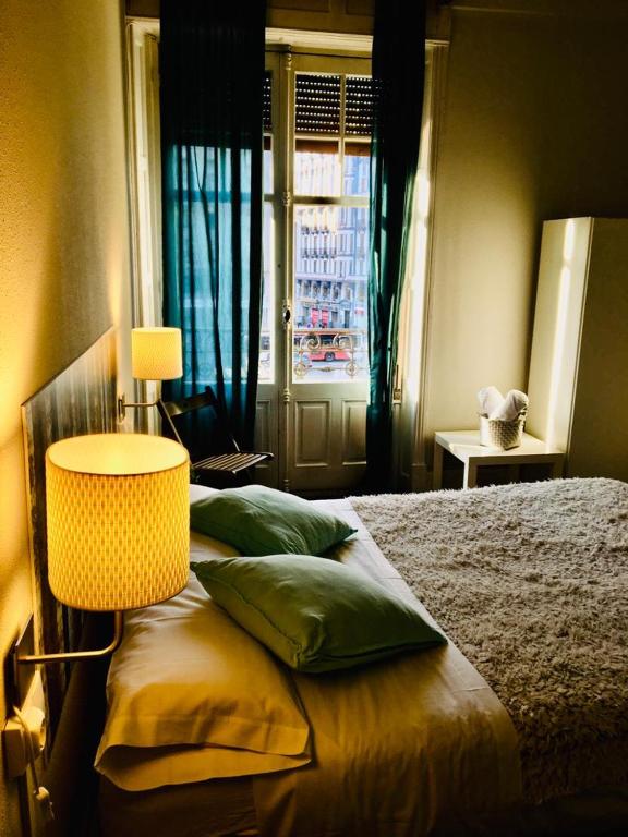 Postel nebo postele na pokoji v ubytování Zentric Hostel
