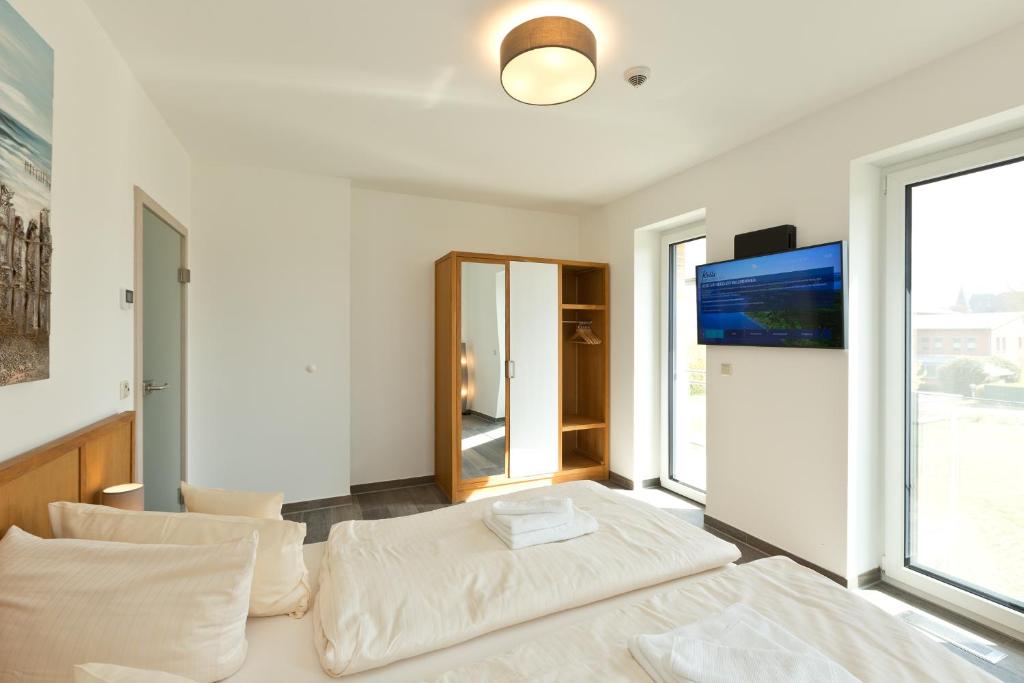 Postel nebo postele na pokoji v ubytování Kells Appartements
