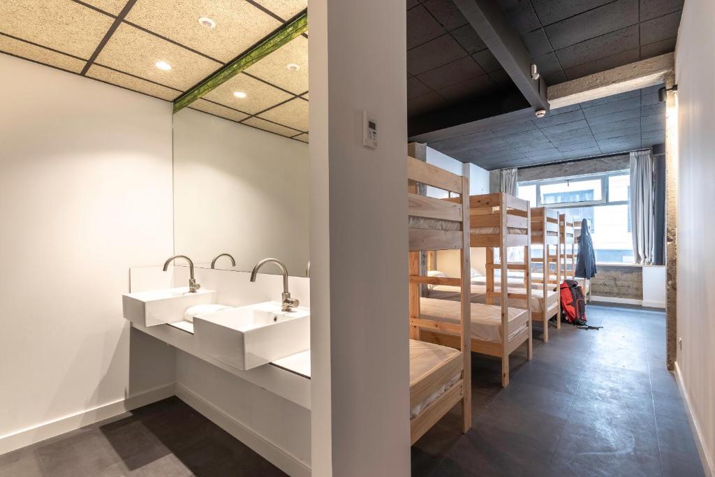 Postel nebo postele na pokoji v ubytování Ekoos Hostel, Bilbao Eko Hostel