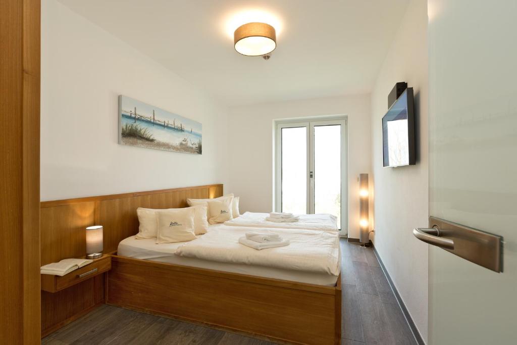 Postel nebo postele na pokoji v ubytování Kells Appartements
