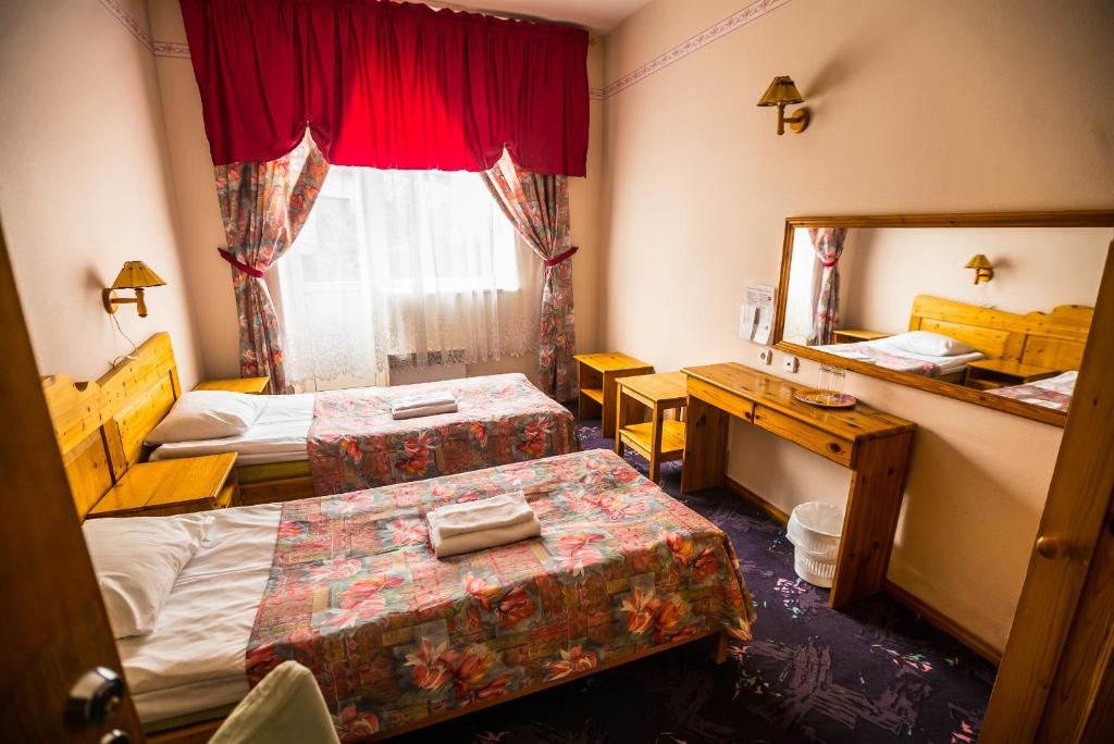Postel nebo postele na pokoji v ubytování Lõokese Hotell
