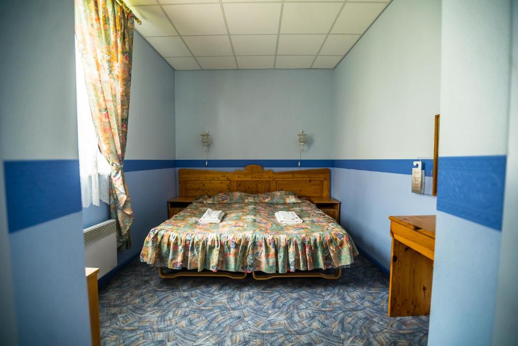 Postel nebo postele na pokoji v ubytování Lõokese Hotell