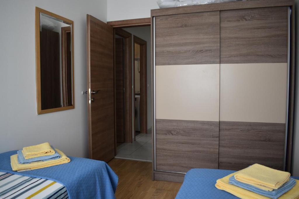 Posteľ alebo postele v izbe v ubytovaní Apartment Vapor